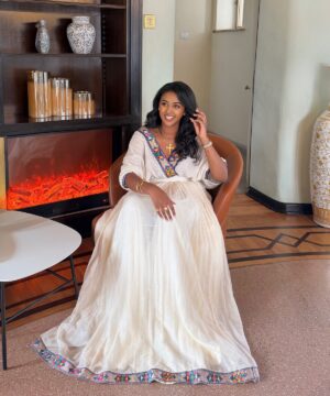 sachin and babi light blue dress Habesha kemis